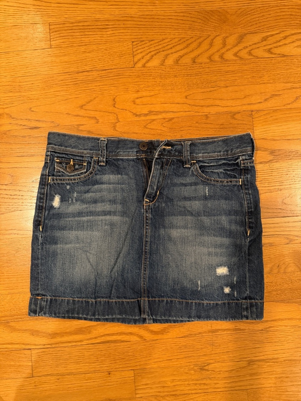 Distressed denim skirt